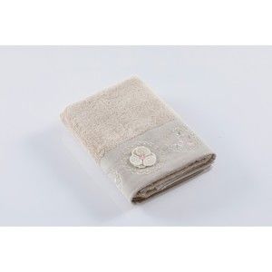 Béžový bavlněný ručník Bella Maison Flower, 50 x 90 cm